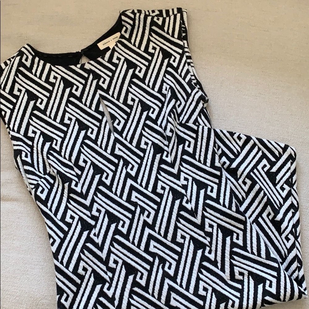 Black and white mini dress with open back